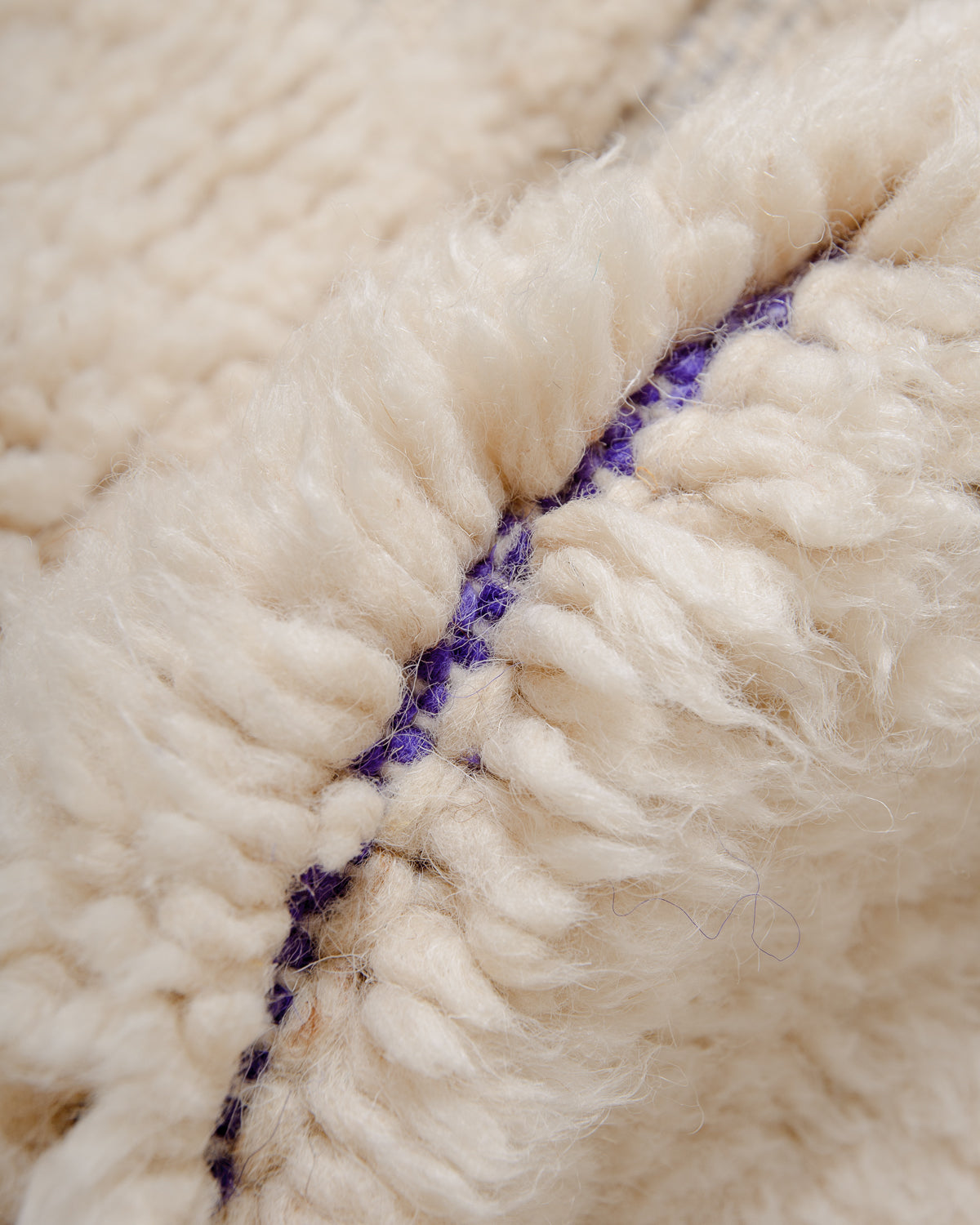 Modern, designer, handcrafted Berber rug from Morocco. Beniourain carpet with beautiful colours and patterns and fluffy wool texture.