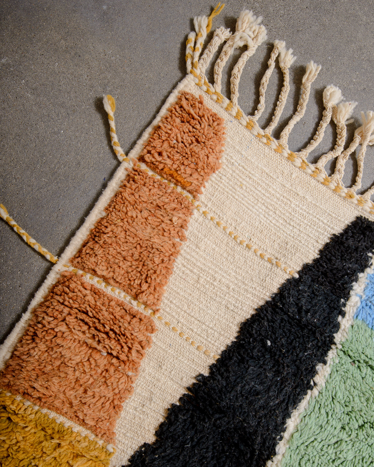 Modern, designer, handcrafted Berber rug from Morocco. Beniourain carpet with beautiful colours and patterns and fluffy wool texture.