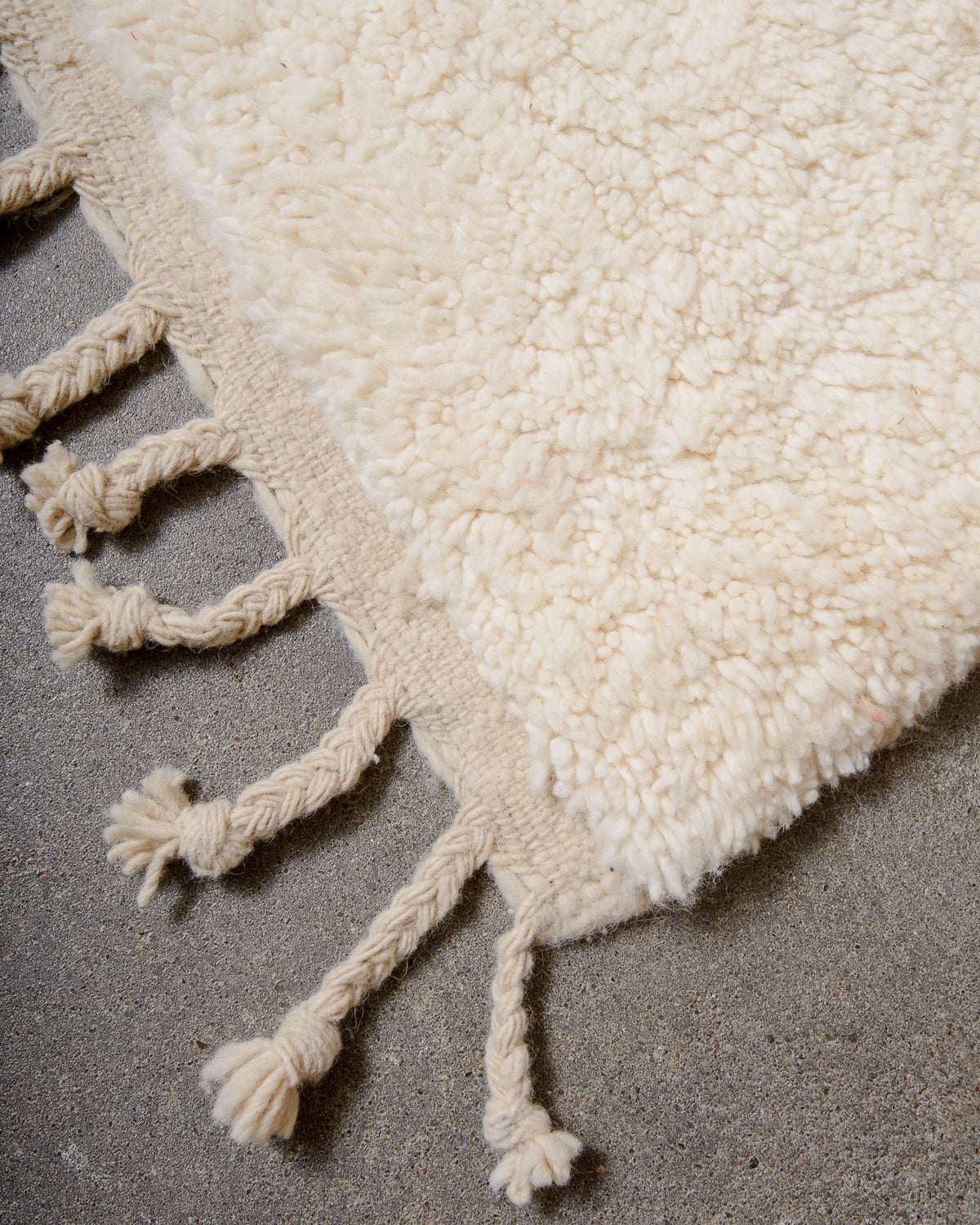 Modern, designer, handcrafted Berber rug from Morocco. Beniourain carpet with minimalist design, natural wool pile and a fluffy texture.
