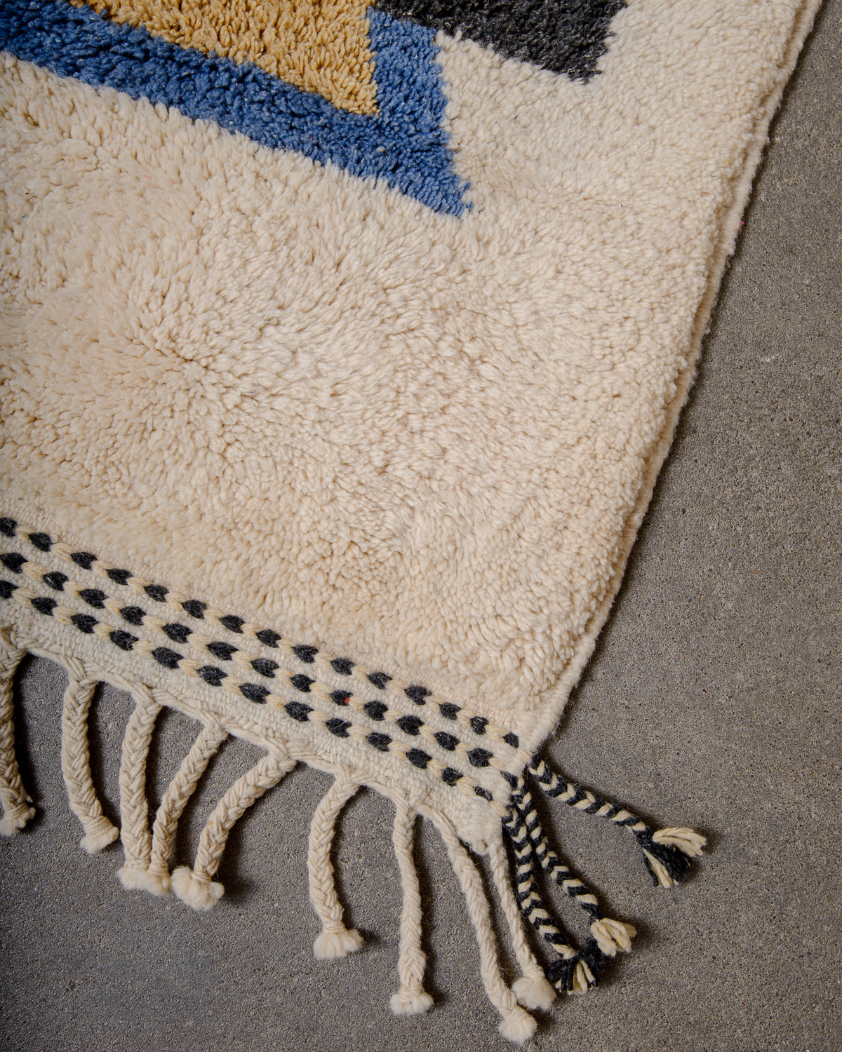 Modern, designer, handcrafted Berber rug from Morocco. Beniourain carpet with beautiful colours and patterns and fluffy wool texture.