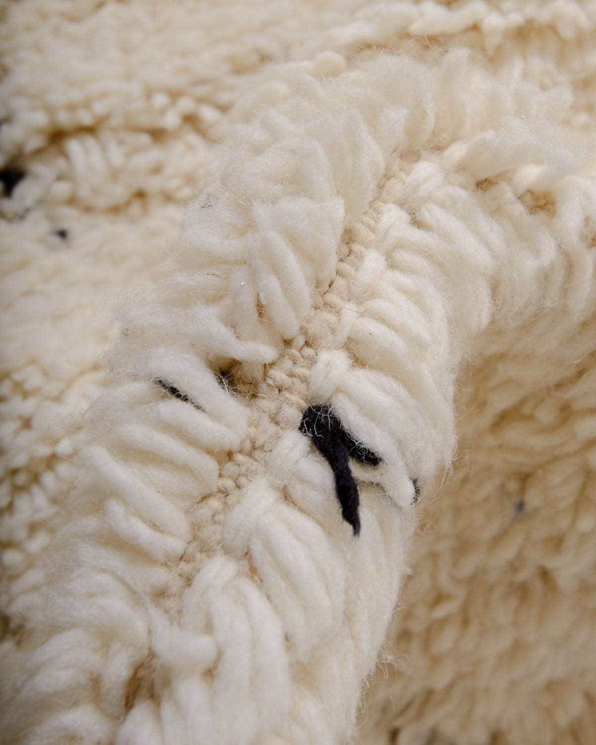 Modern, designer, handcrafted Berber rug from Morocco. Beniourain carpet with minimalist design, natural wool pile and a fluffy texture.