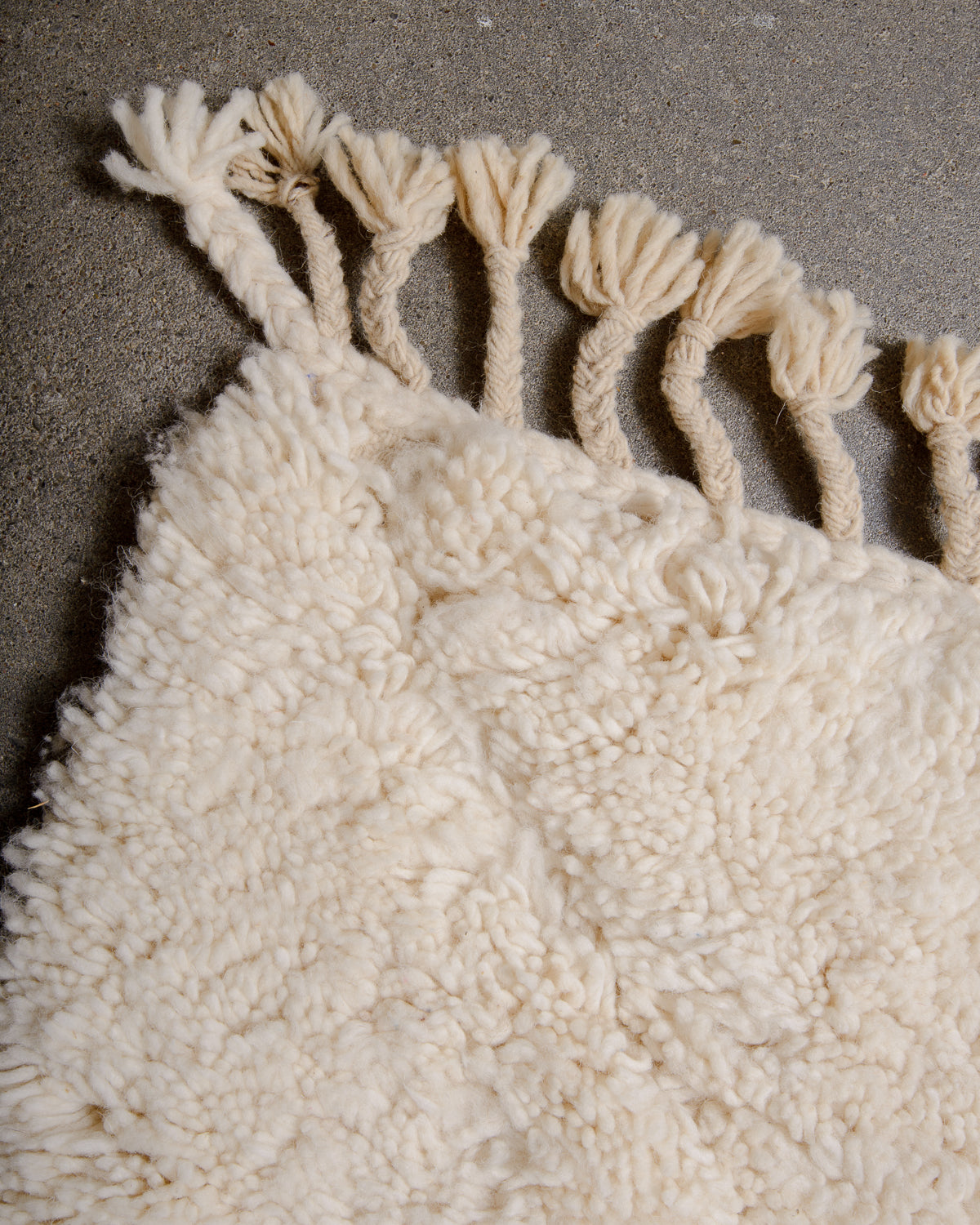 Modern, designer, handcrafted Berber rug from Morocco. Beniourain carpet with minimalist design, natural wool pile and a fluffy texture.