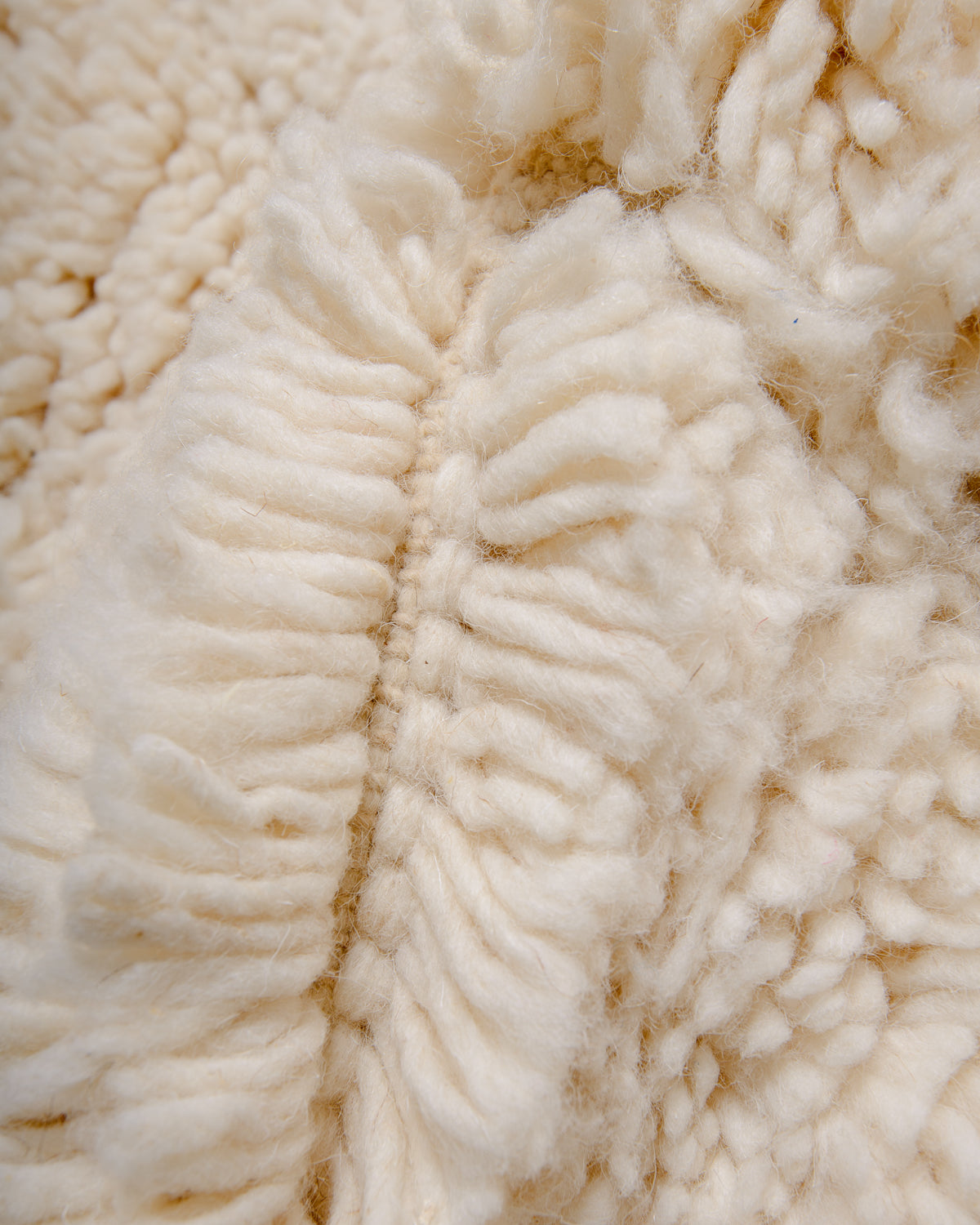 Modern, designer, handcrafted Berber rug from Morocco. Beniourain carpet with minimalist design, natural wool pile and a fluffy texture.