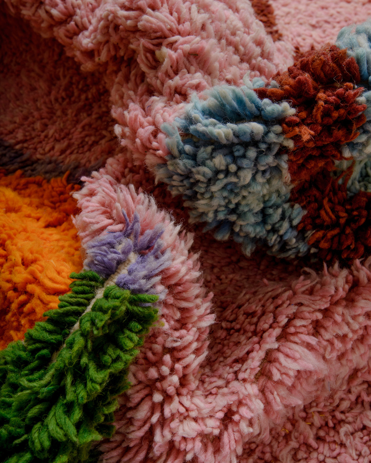 Modern, designer, handcrafted Berber rug from Morocco. Beniourain carpet with beautiful colours and patterns and fluffy wool texture.