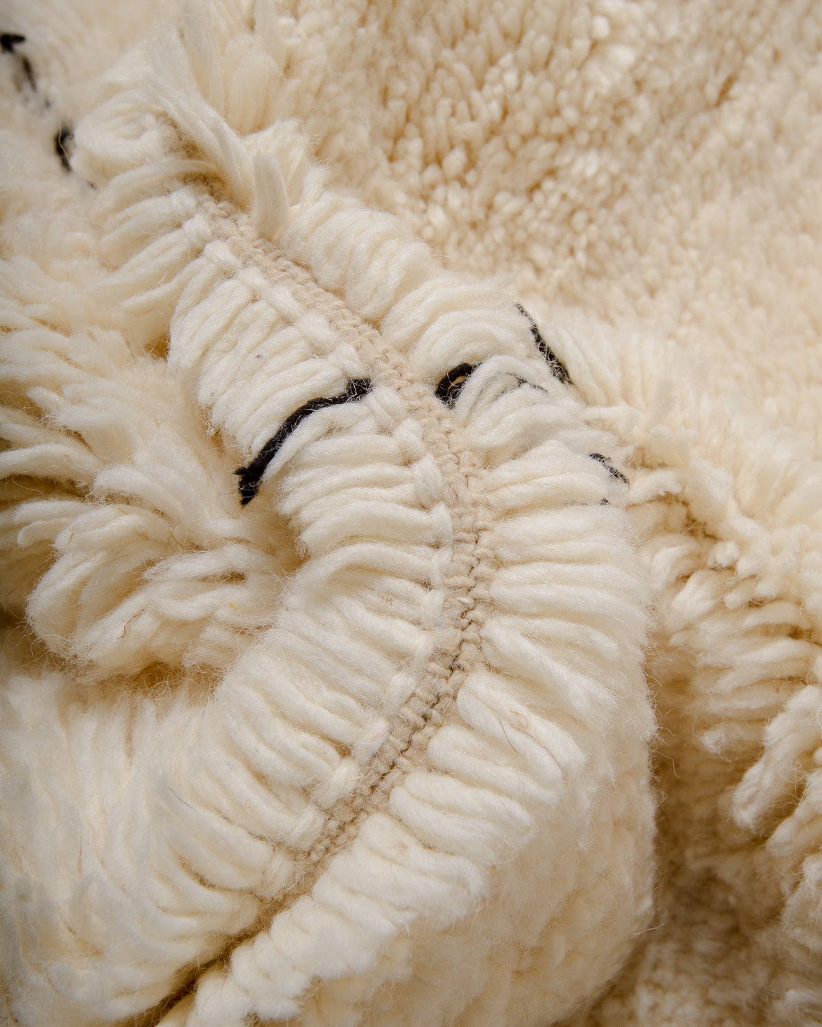 Modern, designer, handcrafted Berber rug from Morocco. Beniourain carpet with minimalist design, natural wool pile and a fluffy texture.