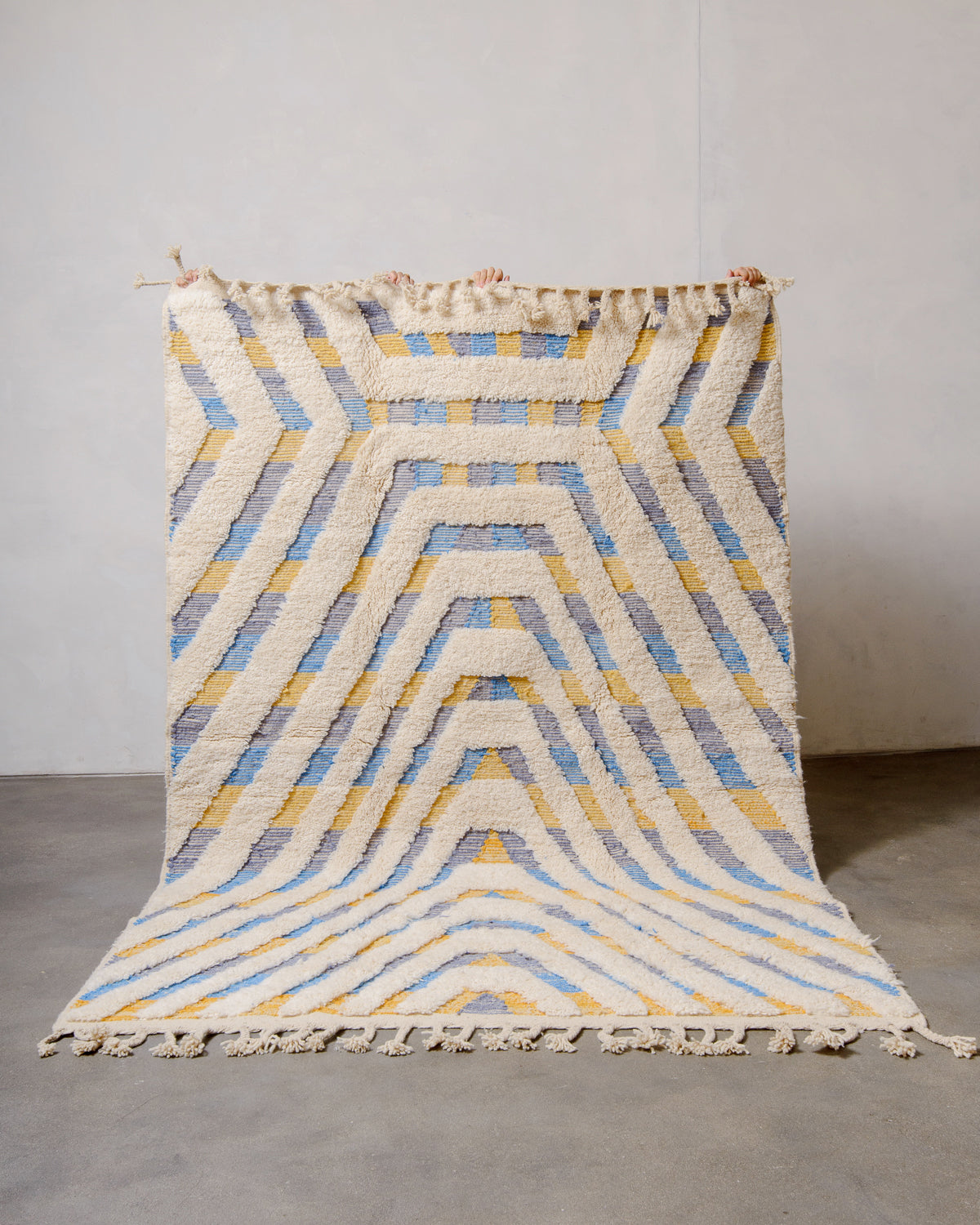 Modern, designer, handcrafted Berber rug from Morocco. Beniourain carpet with beautiful colours and patterns and fluffy wool texture.