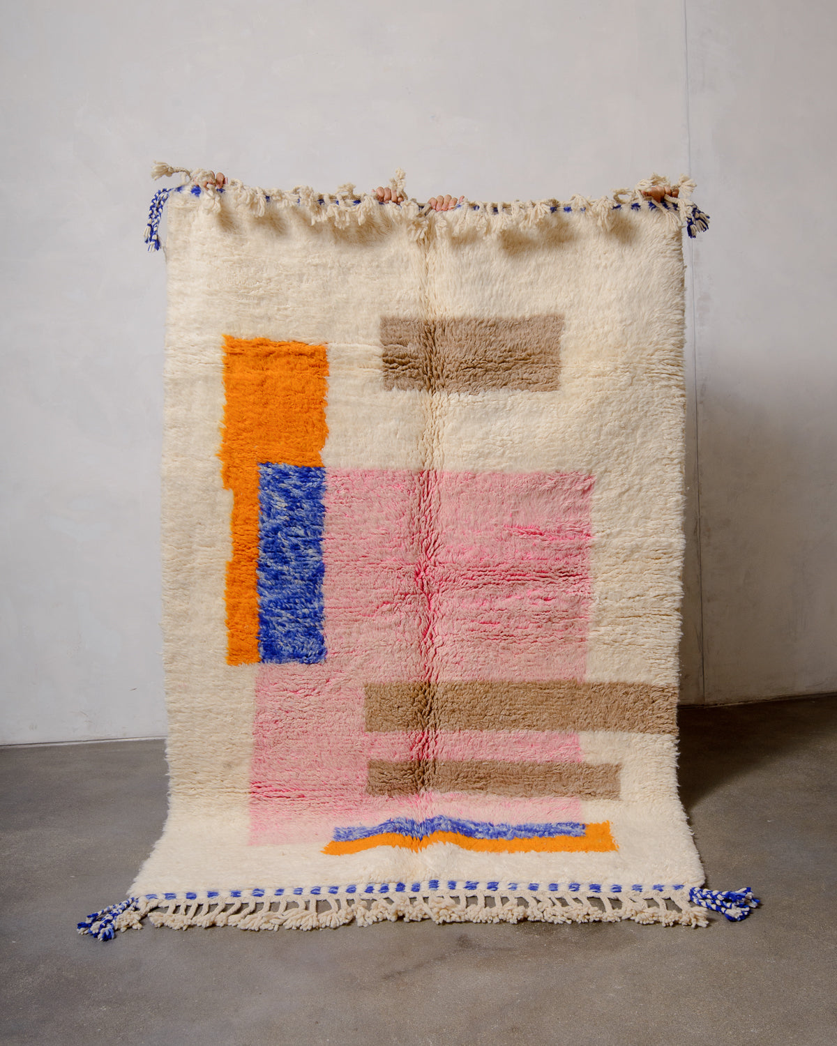 Modern, designer, handcrafted Berber rug from Morocco. Beniourain carpet with beautiful colours and patterns and fluffy wool texture.