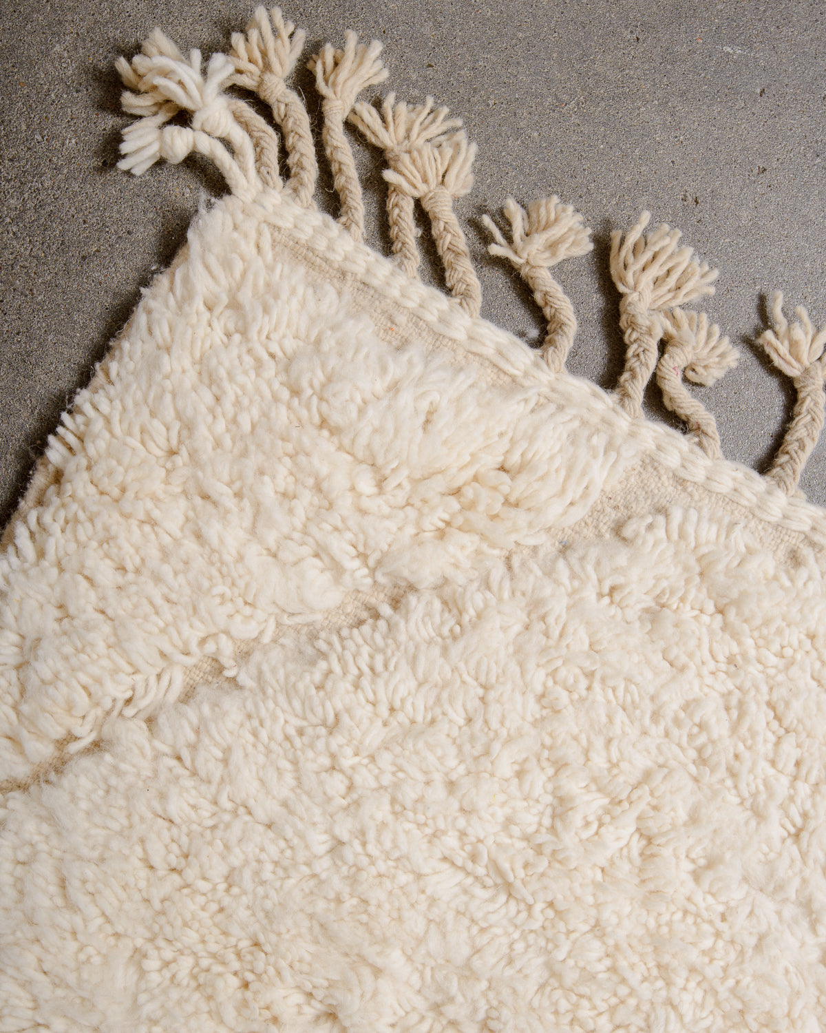 Modern, designer, handcrafted Berber rug from Morocco. Beniourain carpet with minimalist design, natural wool pile and a fluffy texture.