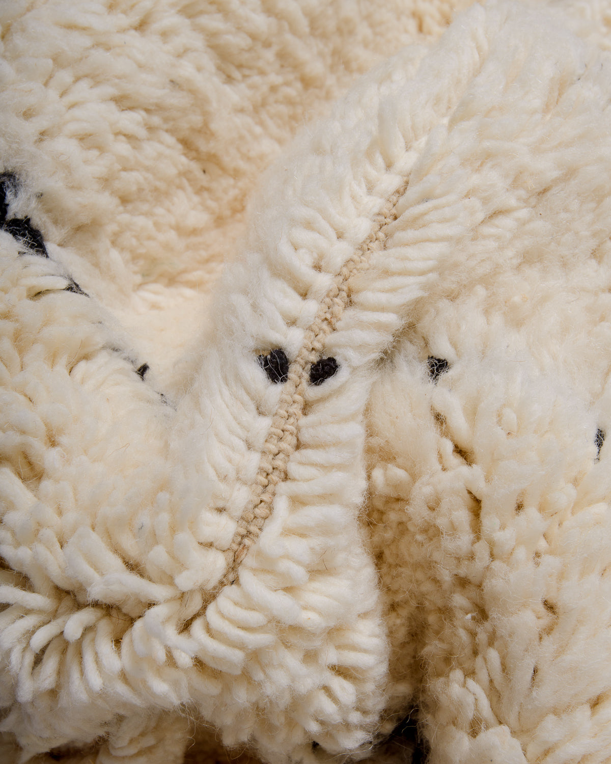 Modern, designer, handcrafted Berber rug from Morocco. Beniourain carpet with minimalist design, natural wool pile and a fluffy texture.