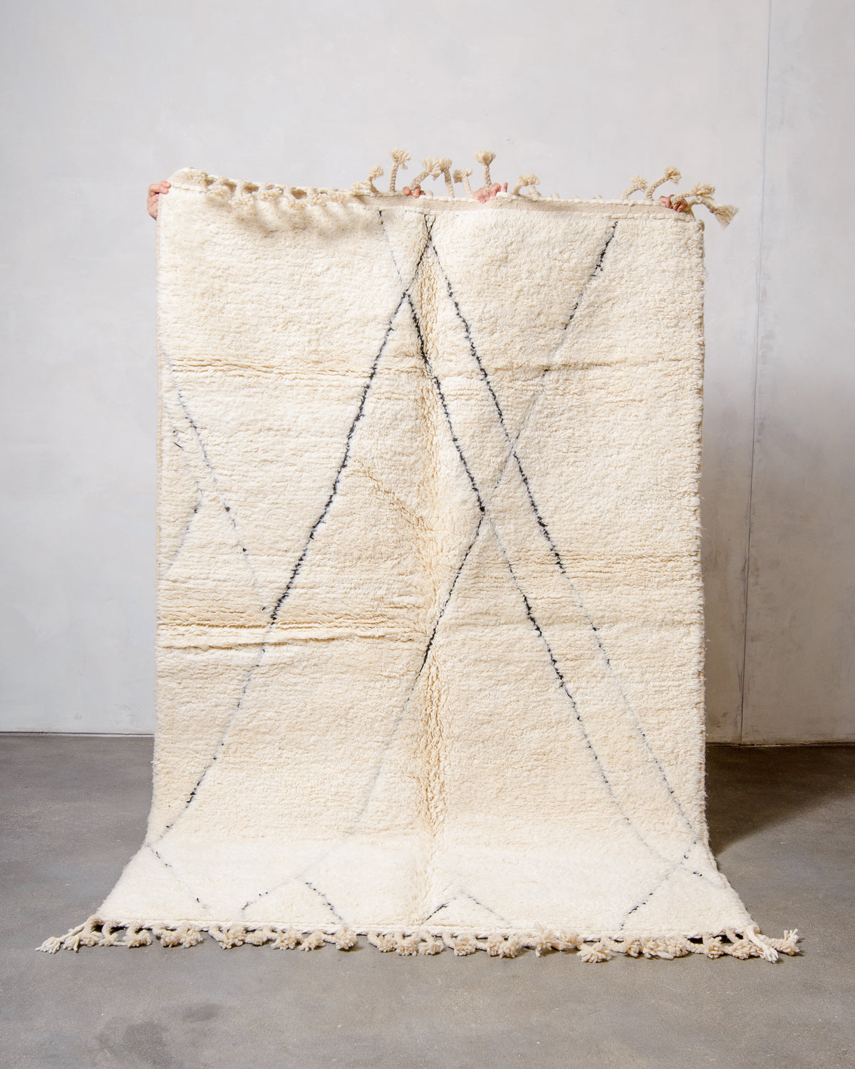 Modern, designer, handcrafted Berber rug from Morocco. Beniourain carpet with minimalist design, natural wool pile and a fluffy texture.