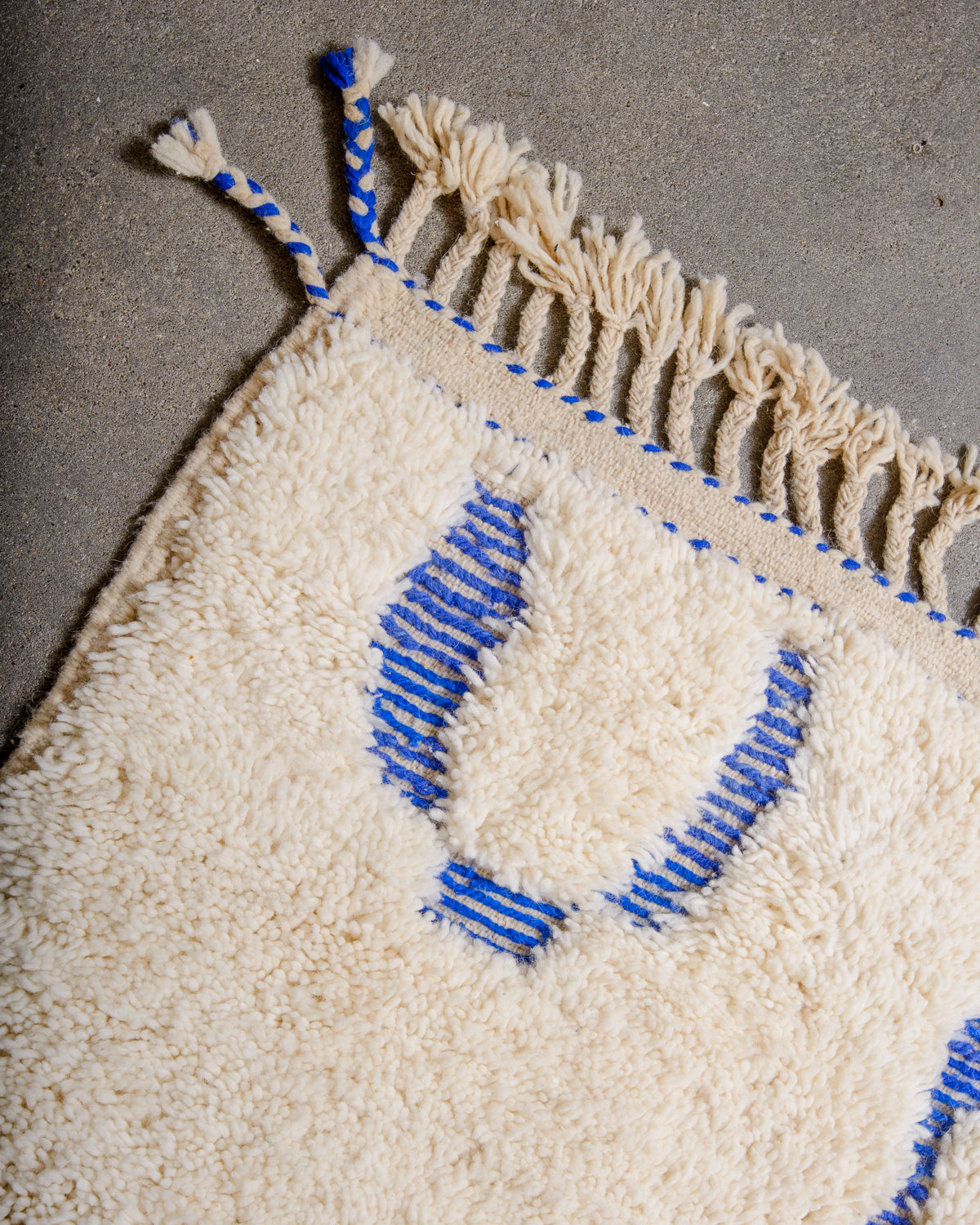 Modern, designer, handcrafted Berber rug from Morocco. Beniourain carpet with minimalist design, natural wool pile and a fluffy texture.