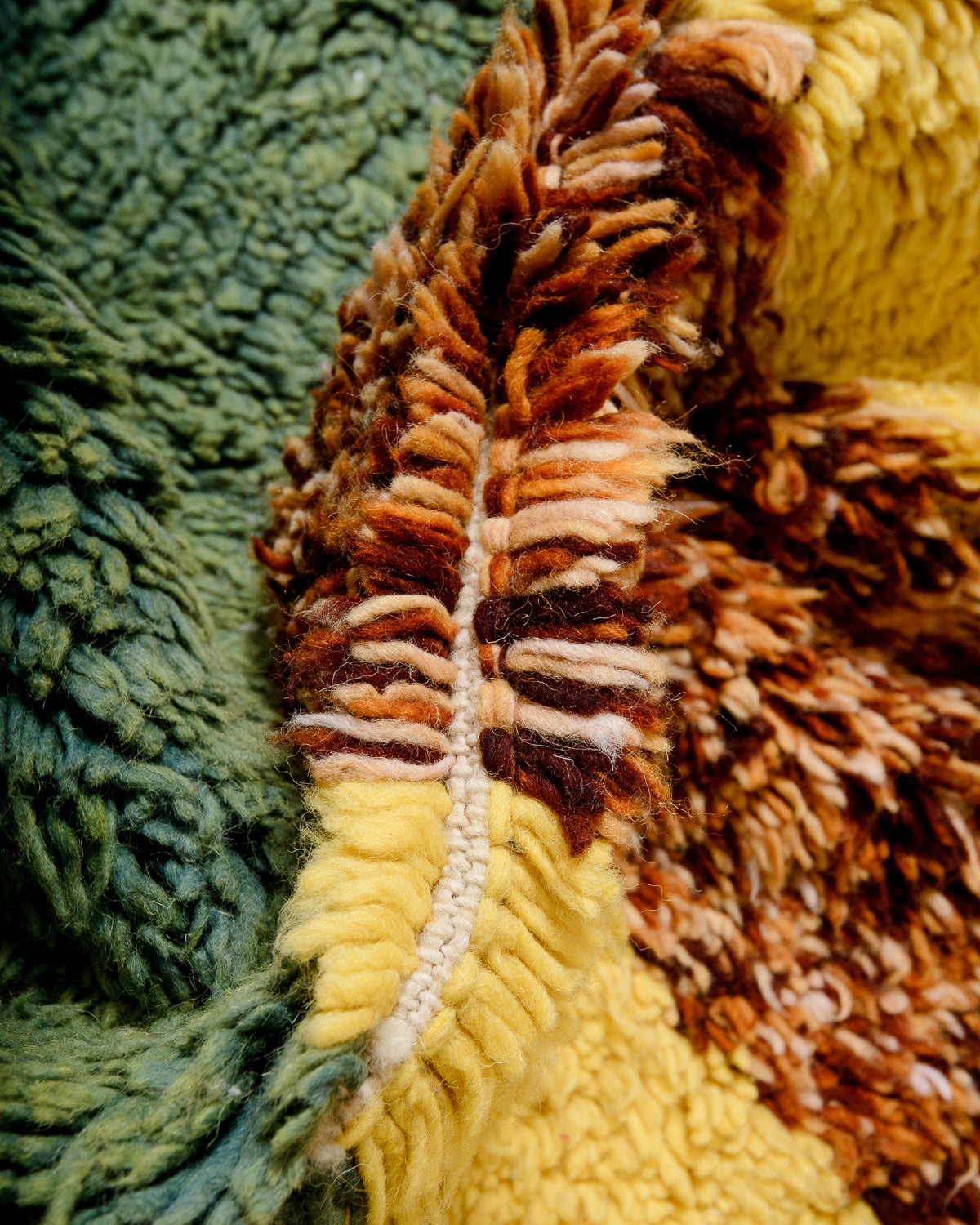 Modern, designer, handcrafted Berber rug from Morocco. Beniourain carpet with beautiful colours and patterns and fluffy wool texture.