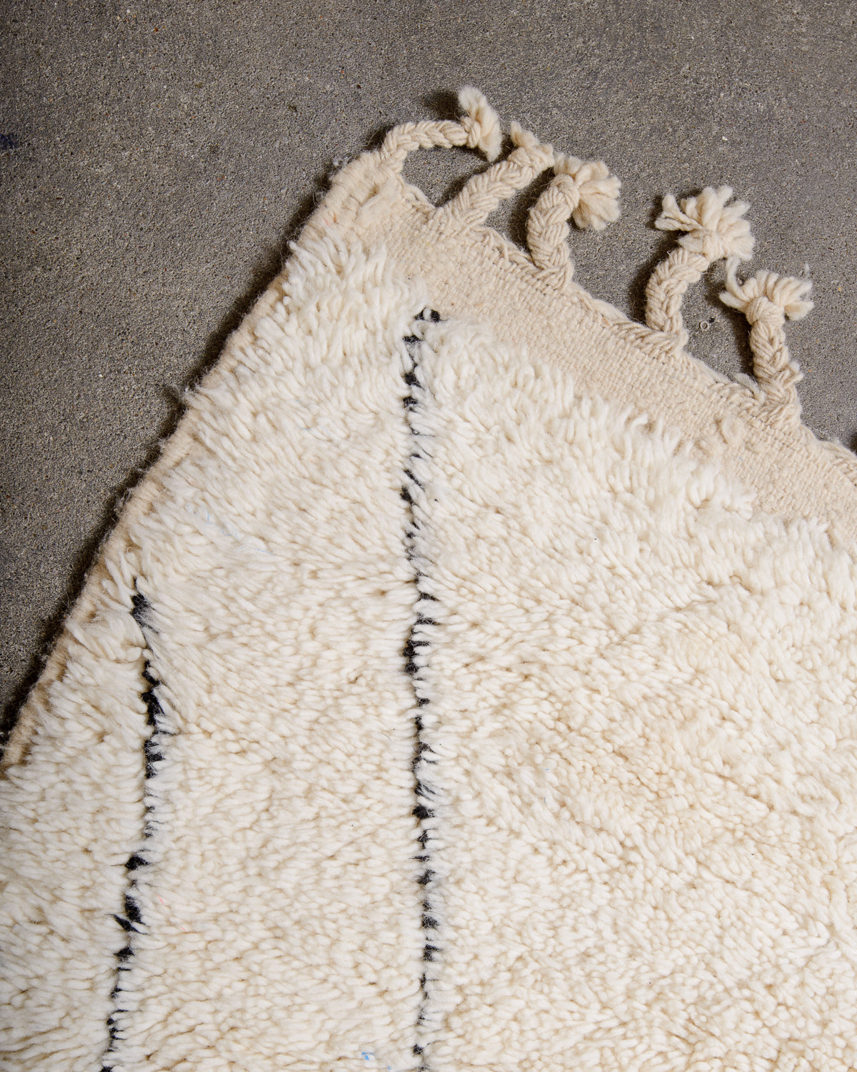 Modern, designer, handcrafted Berber rug from Morocco. Beniourain carpet with minimalist design, natural wool pile and a fluffy texture.