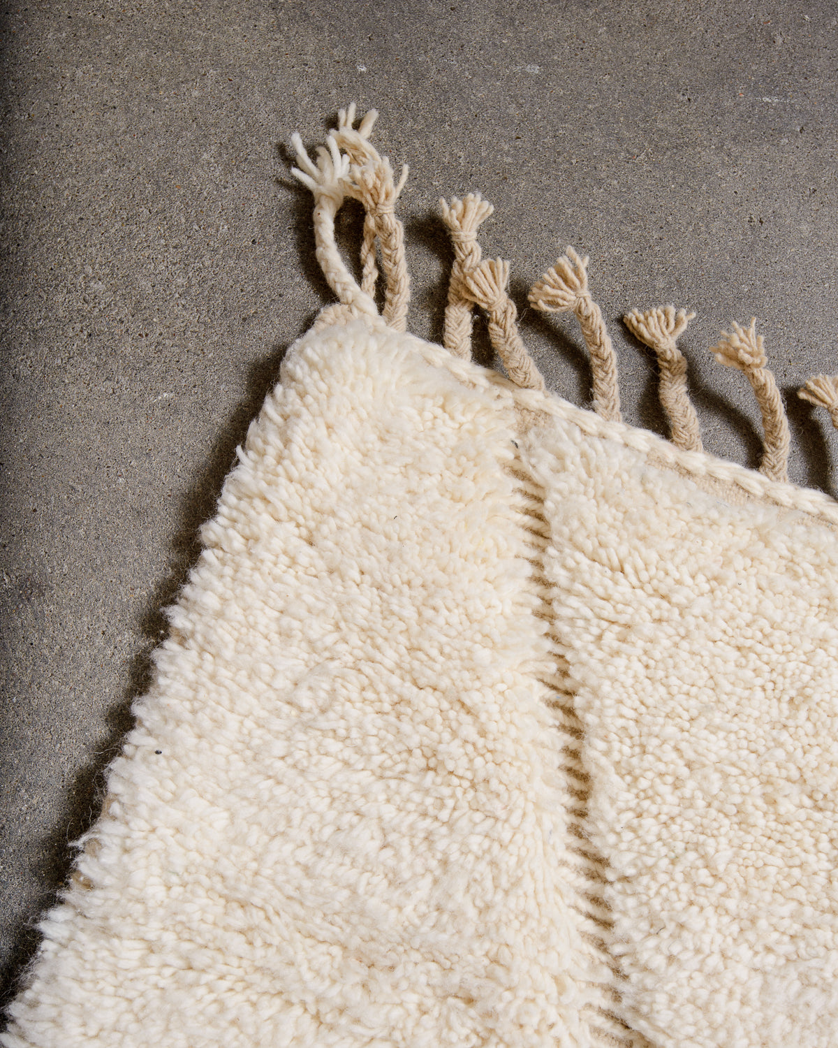 Modern, designer, handcrafted Berber rug from Morocco. Beniourain carpet with minimalist design, natural wool pile and a fluffy texture.