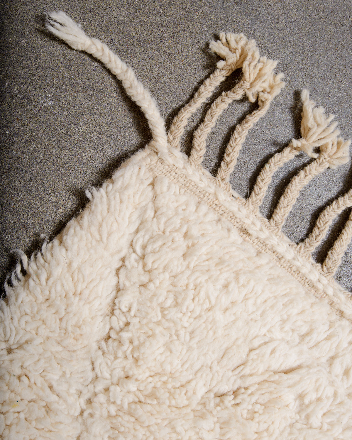 Modern, designer, handcrafted Berber rug from Morocco. Beniourain carpet with minimalist design, natural wool pile and a fluffy texture.