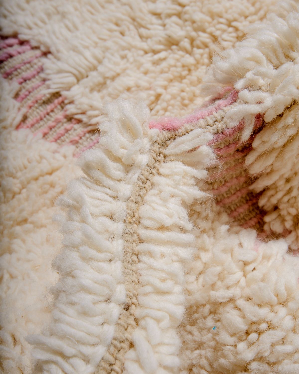 Modern, designer, handcrafted Berber rug from Morocco. Beniourain carpet with minimalist design, natural wool pile and a fluffy texture.