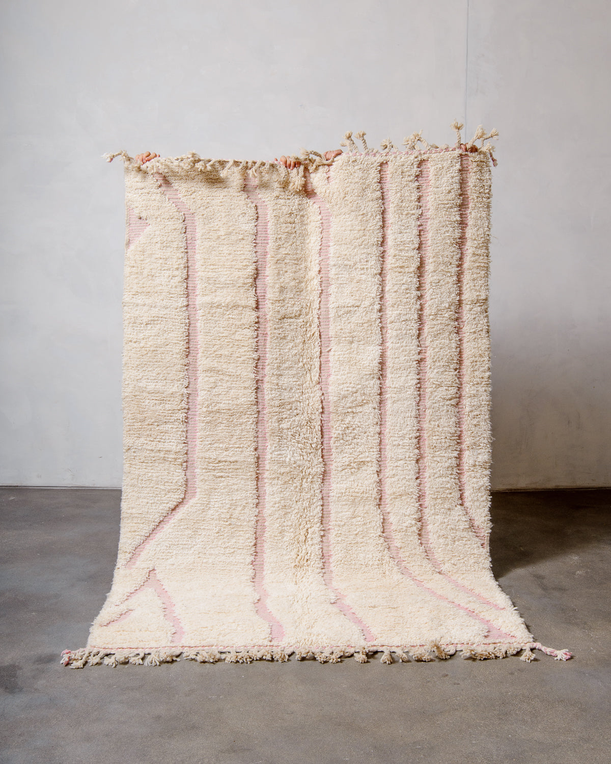 Modern, designer, handcrafted Berber rug from Morocco. Beniourain carpet with minimalist design, natural wool pile and a fluffy texture.