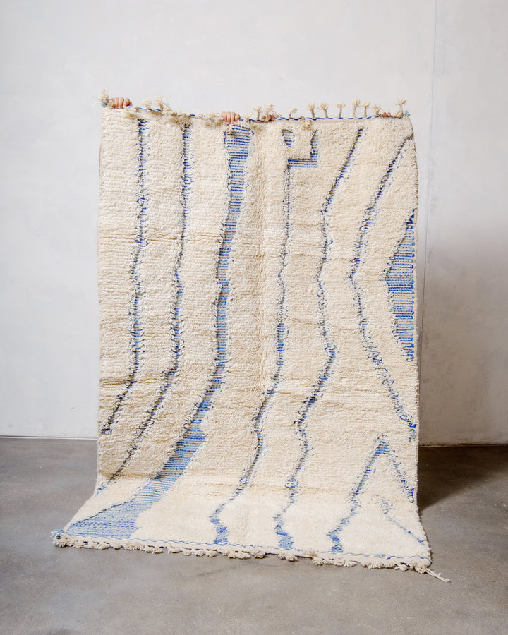Modern, designer, handcrafted Berber rug from Morocco. Beniourain carpet with minimalist design, natural wool pile and a fluffy texture.