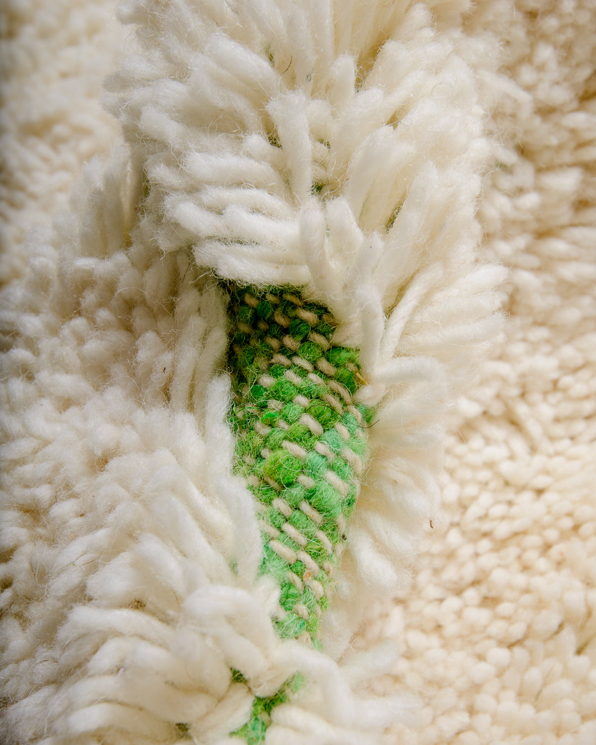 Modern, designer, handcrafted Berber rug from Morocco. Beniourain carpet with minimalist design, natural wool pile and a fluffy texture.