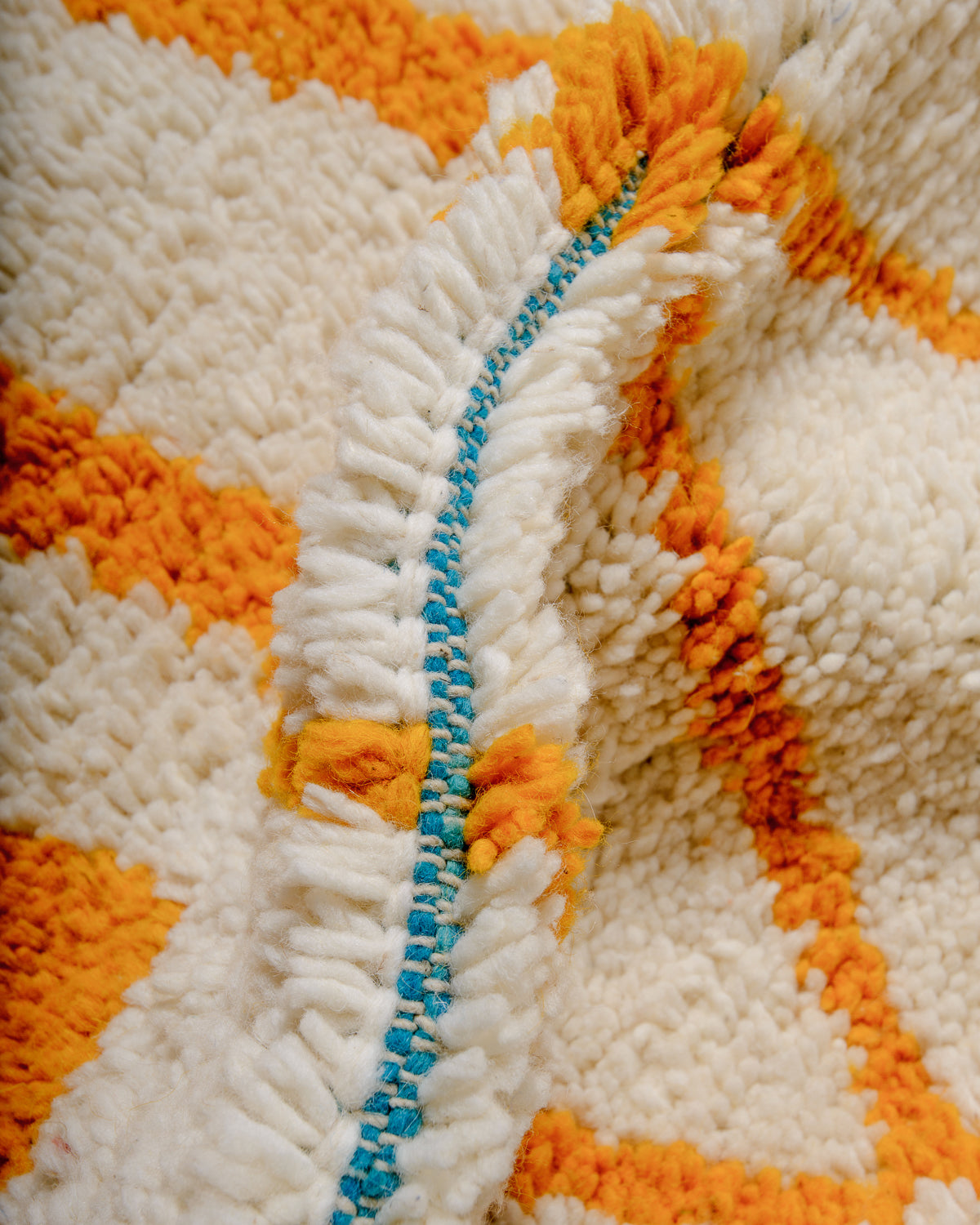 Modern, designer, handcrafted Berber rug from Morocco. Beniourain carpet with beautiful colours and patterns and fluffy wool texture.