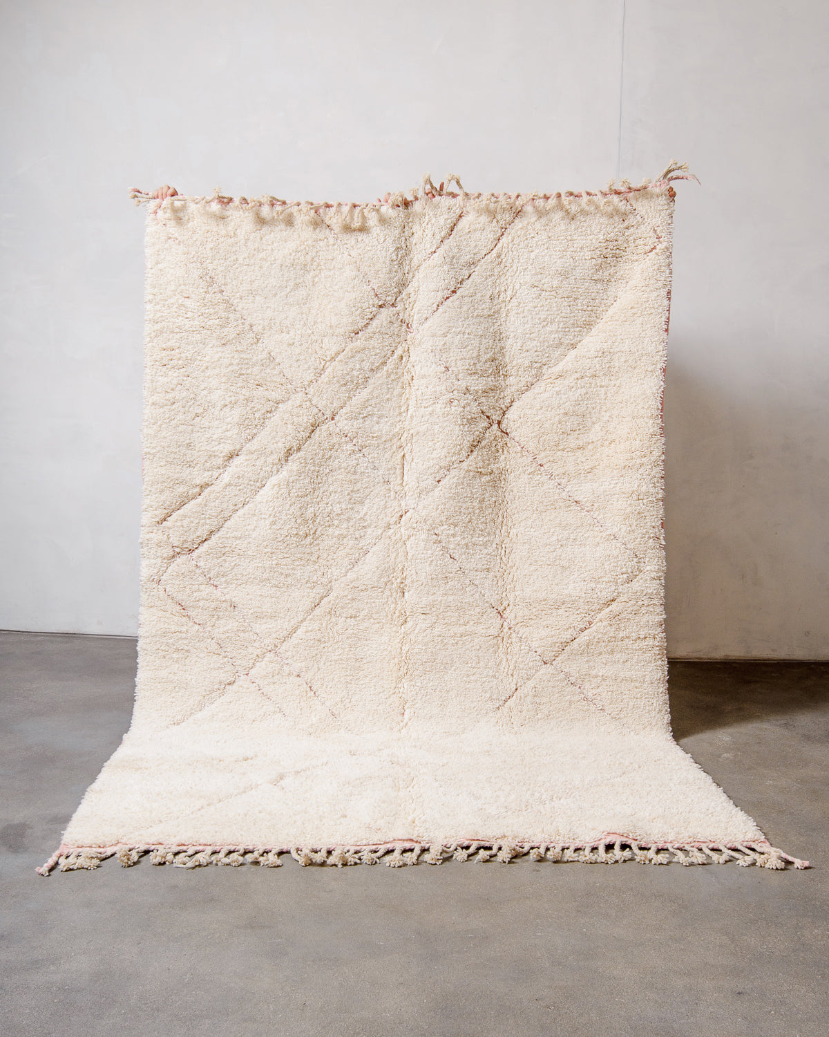 Modern, designer, handcrafted Berber rug from Morocco. Beniourain carpet with beautiful colours and patterns and fluffy wool texture.