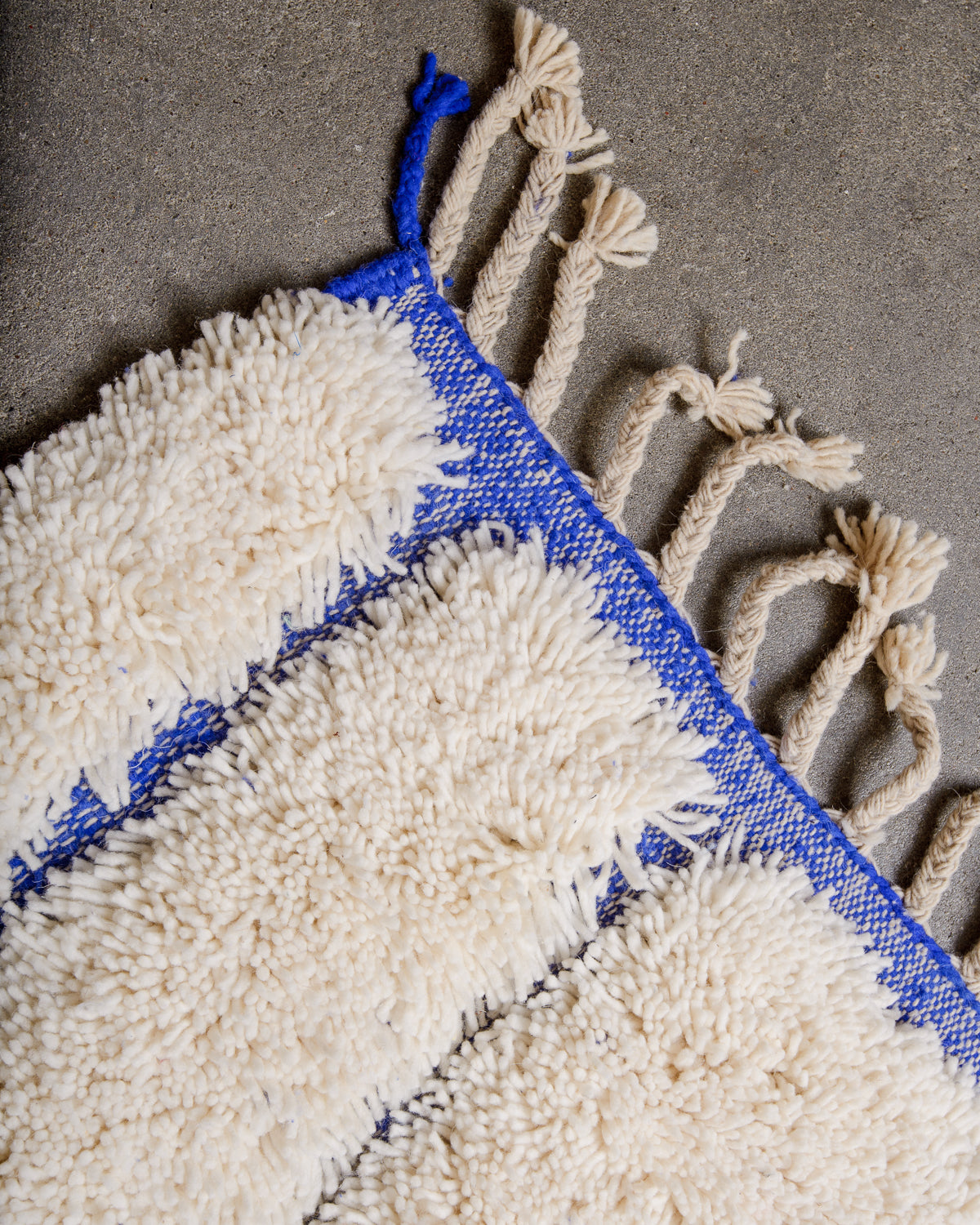 Modern, designer, handcrafted Berber rug from Morocco. Beniourain carpet with beautiful colours and patterns and fluffy wool texture.