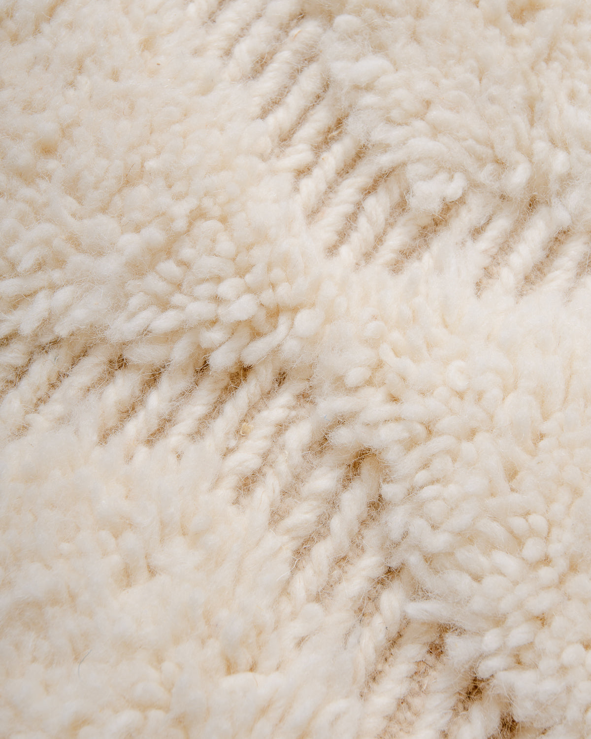 Modern, designer, handcrafted Berber rug from Morocco. Beniourain carpet with minimalist design, natural wool pile and a fluffy texture.