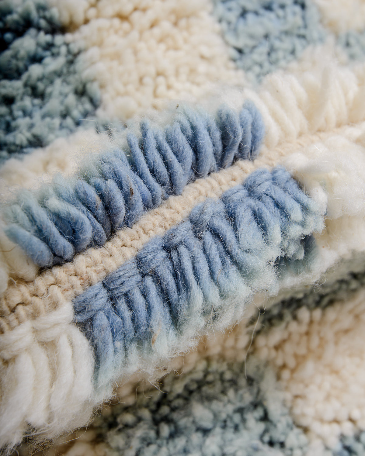 Modern, designer, handcrafted Berber rug from Morocco. Beniourain carpet with beautiful colours and patterns and fluffy wool texture.