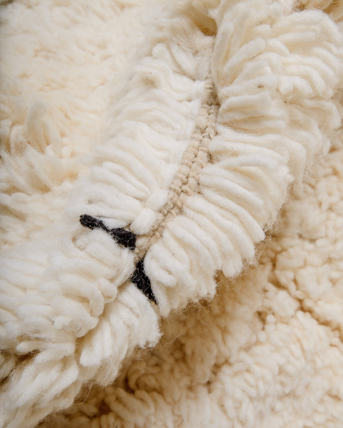 Modern, designer, handcrafted Berber rug from Morocco. Beniourain carpet with minimalist design, natural wool pile and a fluffy texture.