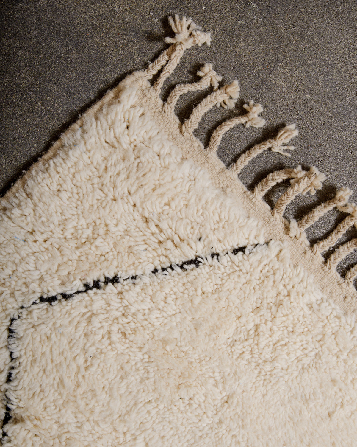 Modern, designer, handcrafted Berber rug from Morocco. Beniourain carpet with minimalist design, natural wool pile and a fluffy texture.