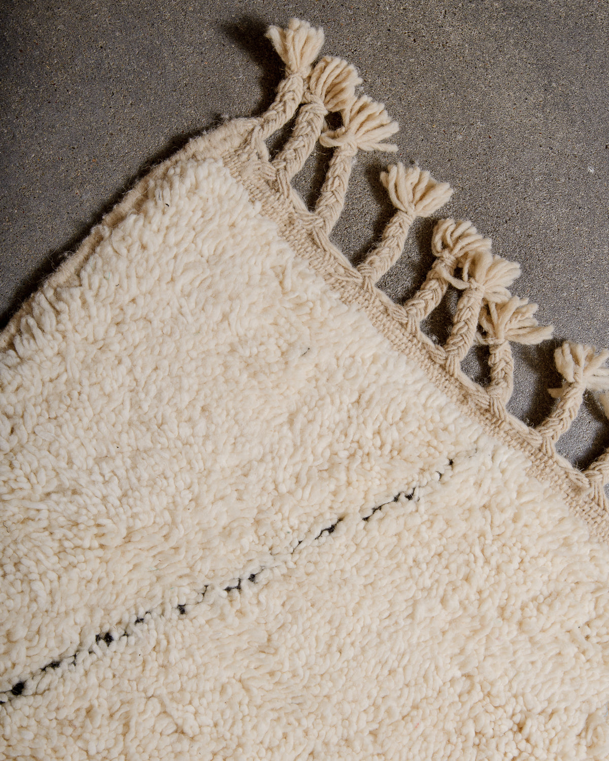 Modern, designer, handcrafted Berber rug from Morocco. Beniourain carpet with minimalist design, natural wool pile and a fluffy texture.