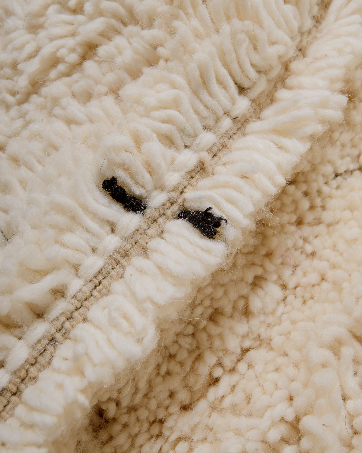 Modern, designer, handcrafted Berber rug from Morocco. Beniourain carpet with minimalist design, natural wool pile and a fluffy texture.