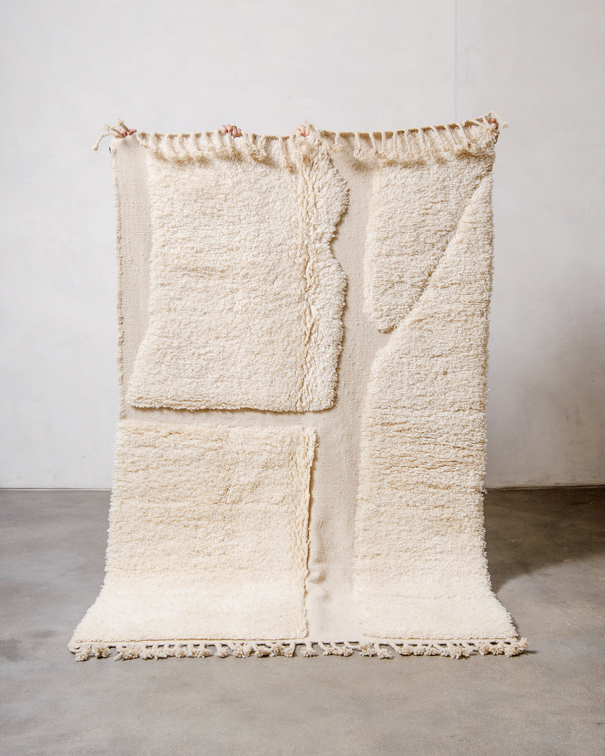 Modern, designer, handcrafted Berber rug from Morocco. Beniourain carpet with beautiful colours and patterns and fluffy wool texture.