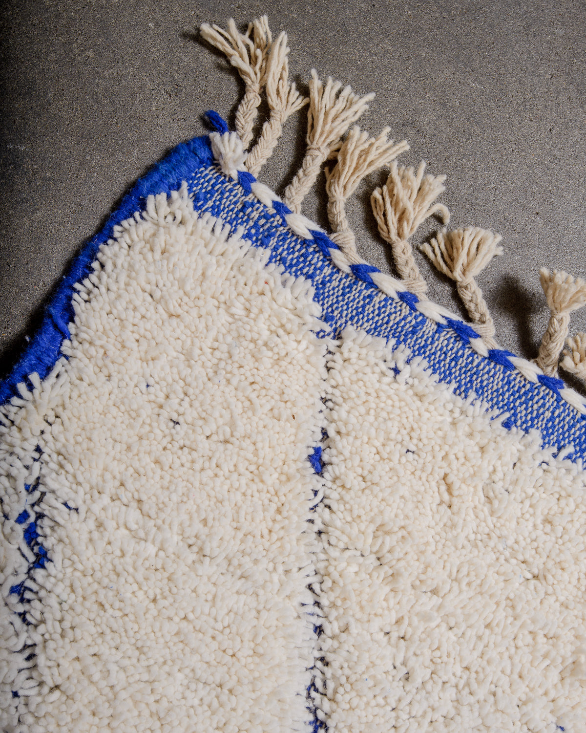 Modern, designer, handcrafted Berber rug from Morocco. Beniourain carpet with minimalist design, natural wool pile and a fluffy texture.