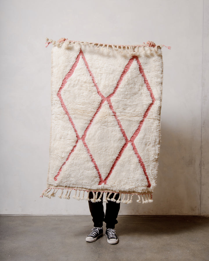 Modern, designer, handcrafted Berber rug from Morocco. Beniourain carpet with minimalist design, natural wool pile and a fluffy texture.