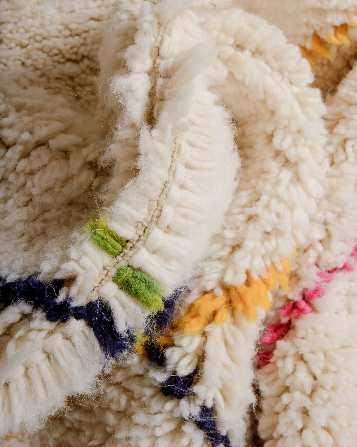 Modern, designer, handcrafted Berber runner rug from Morocco. Beniourain carpet with beautiful colours and patterns and fluffy wool texture.