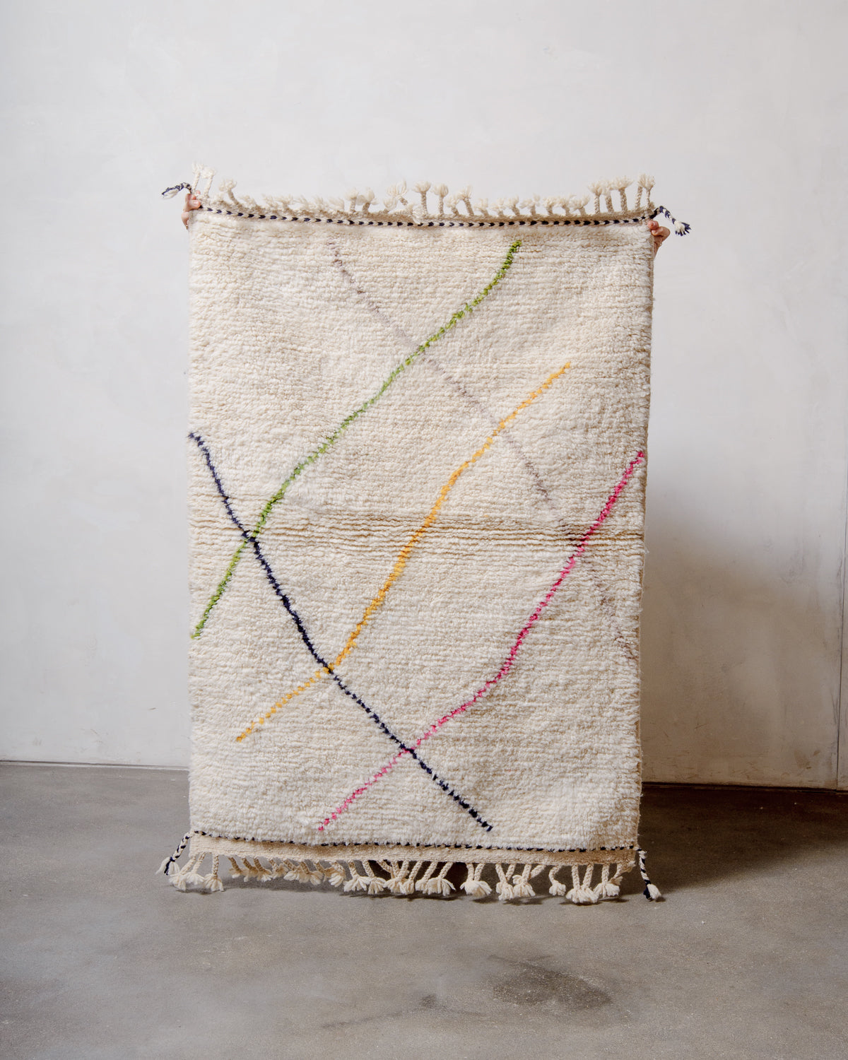 Modern, designer, handcrafted Berber runner rug from Morocco. Beniourain carpet with beautiful colours and patterns and fluffy wool texture.