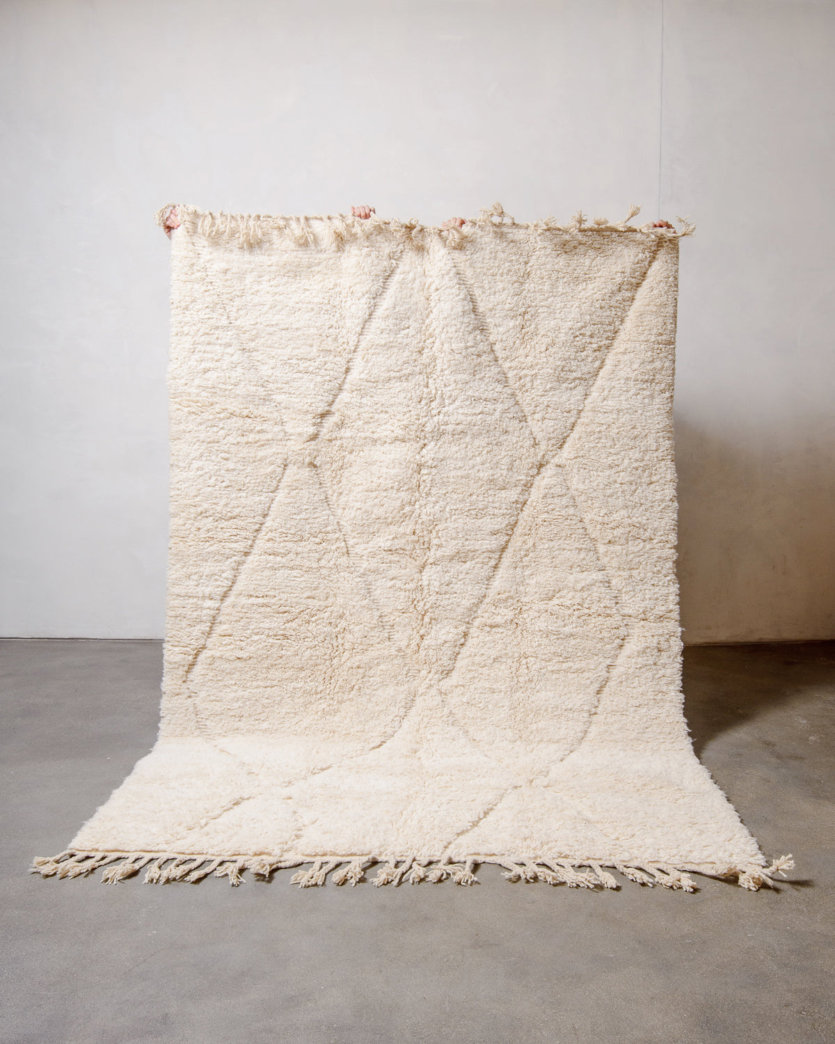 Modern, designer, handcrafted Berber rug from Morocco. Beniourain carpet with minimalist design, natural wool pile and a fluffy texture.