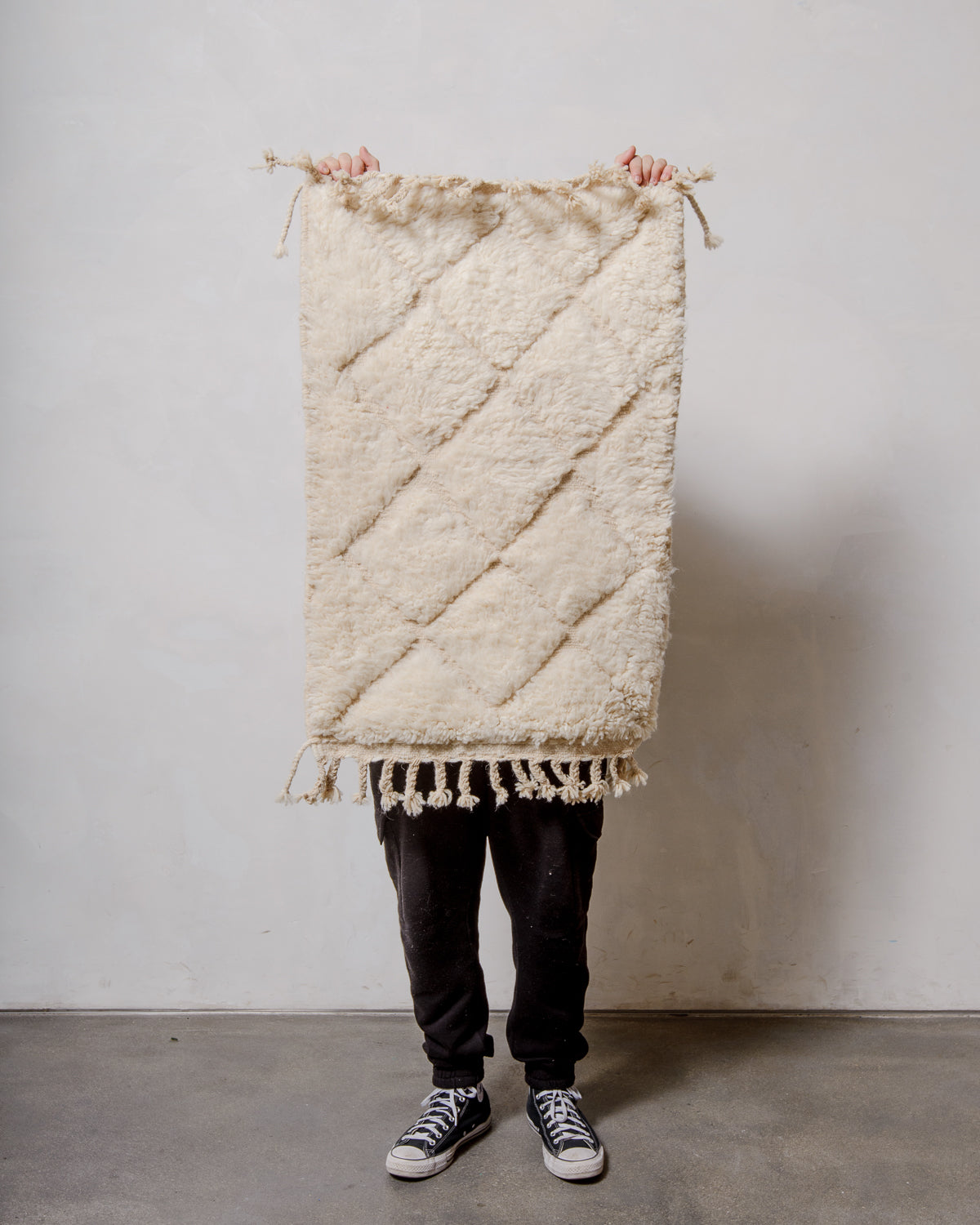 Modern, designer, handcrafted Berber rug from Morocco. Beniourain carpet with minimalist design, natural wool pile and a fluffy texture.