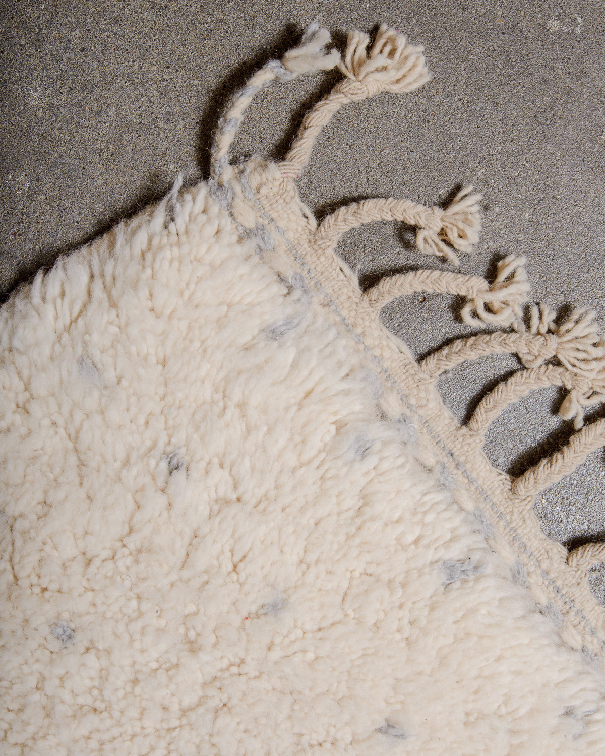 Modern, designer, handcrafted Berber rug from Morocco. Beniourain carpet with minimalist design, natural wool pile and a fluffy texture.