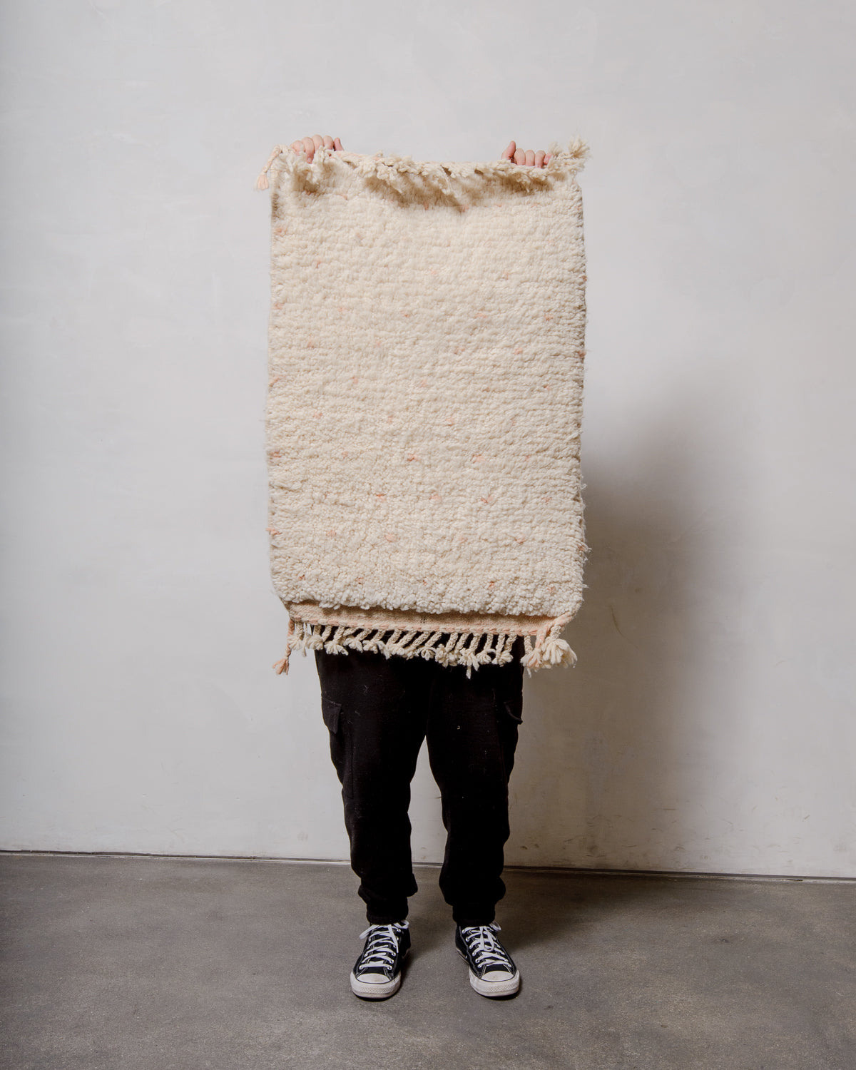 Modern, designer, handcrafted Berber rug from Morocco. Beniourain carpet with minimalist design, natural wool pile and a fluffy texture.