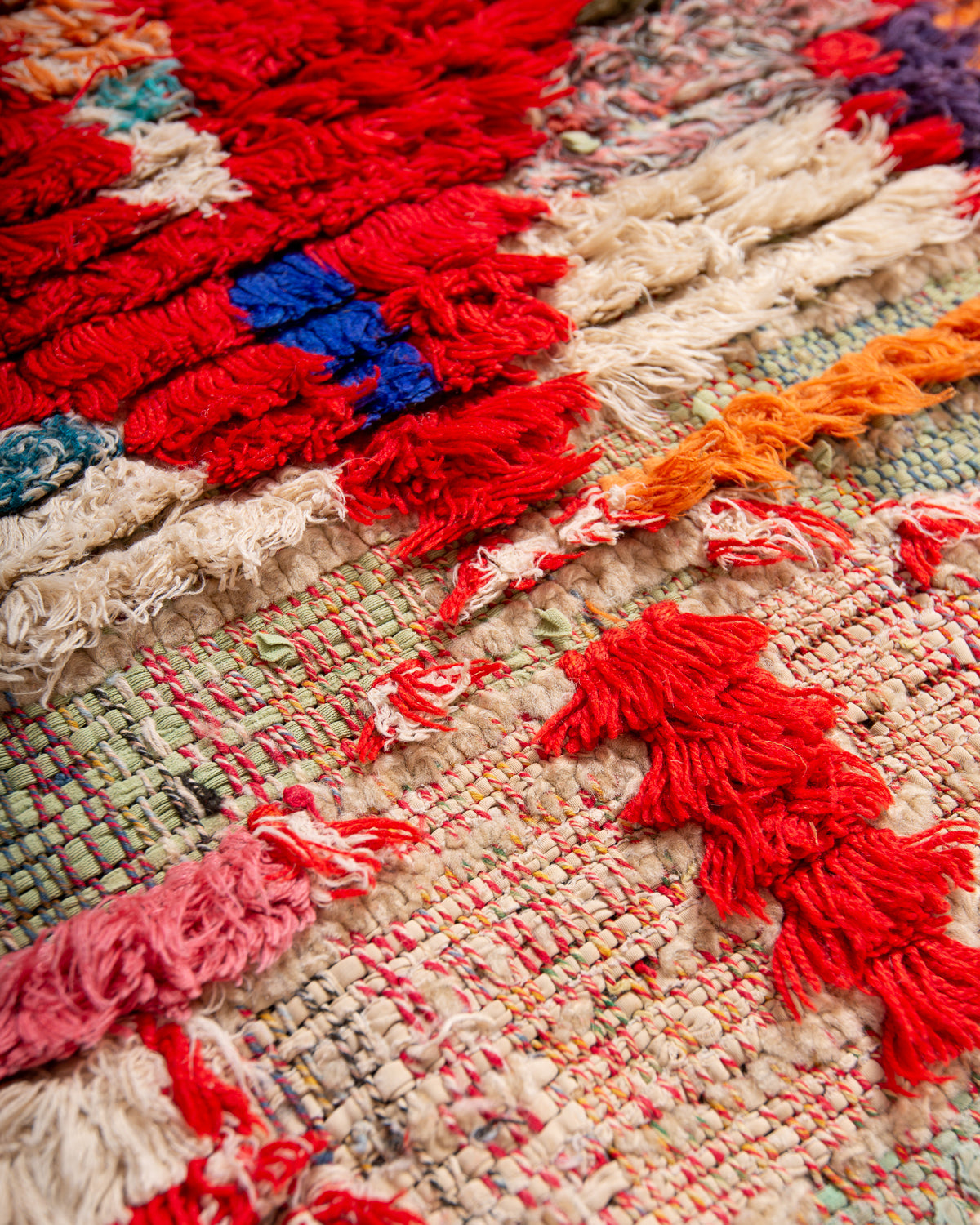 Modern designer vintage handcrafted Berber rug from Morocco. Boucherouite runner rug with beautiful colors and patterns.