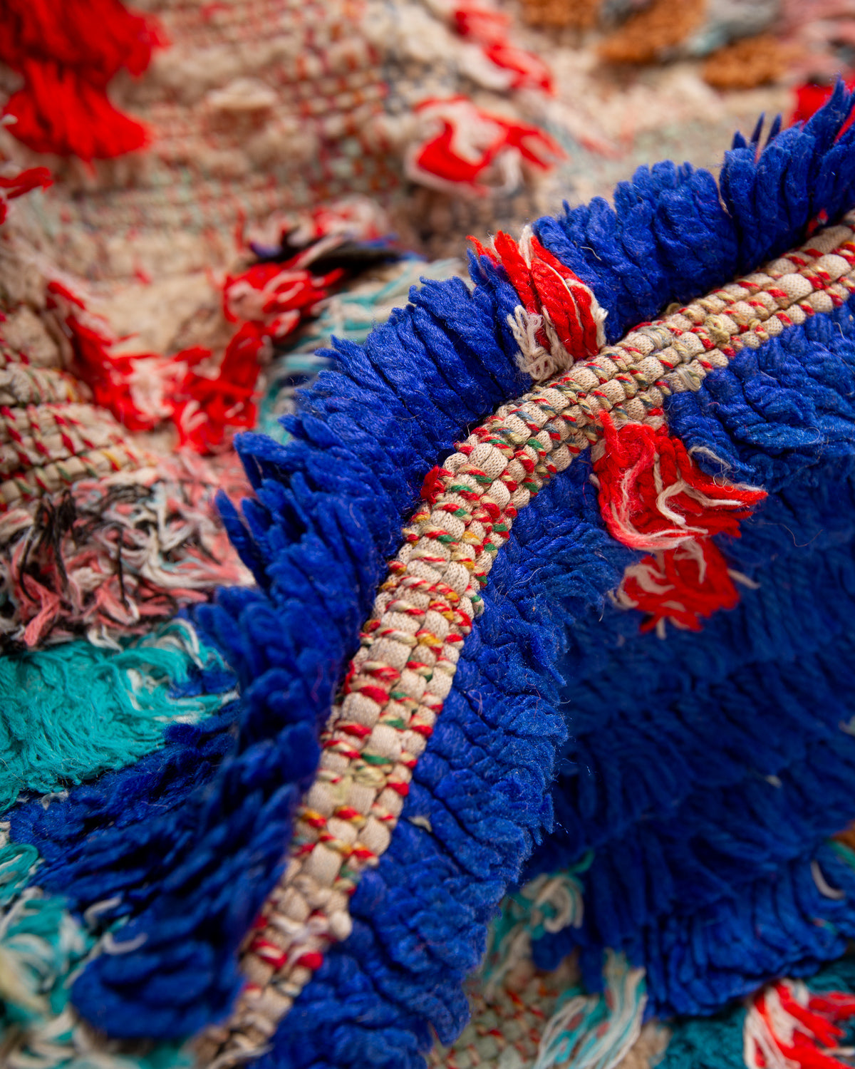 Modern designer vintage handcrafted Berber rug from Morocco. Boucherouite runner rug with beautiful colors and patterns.