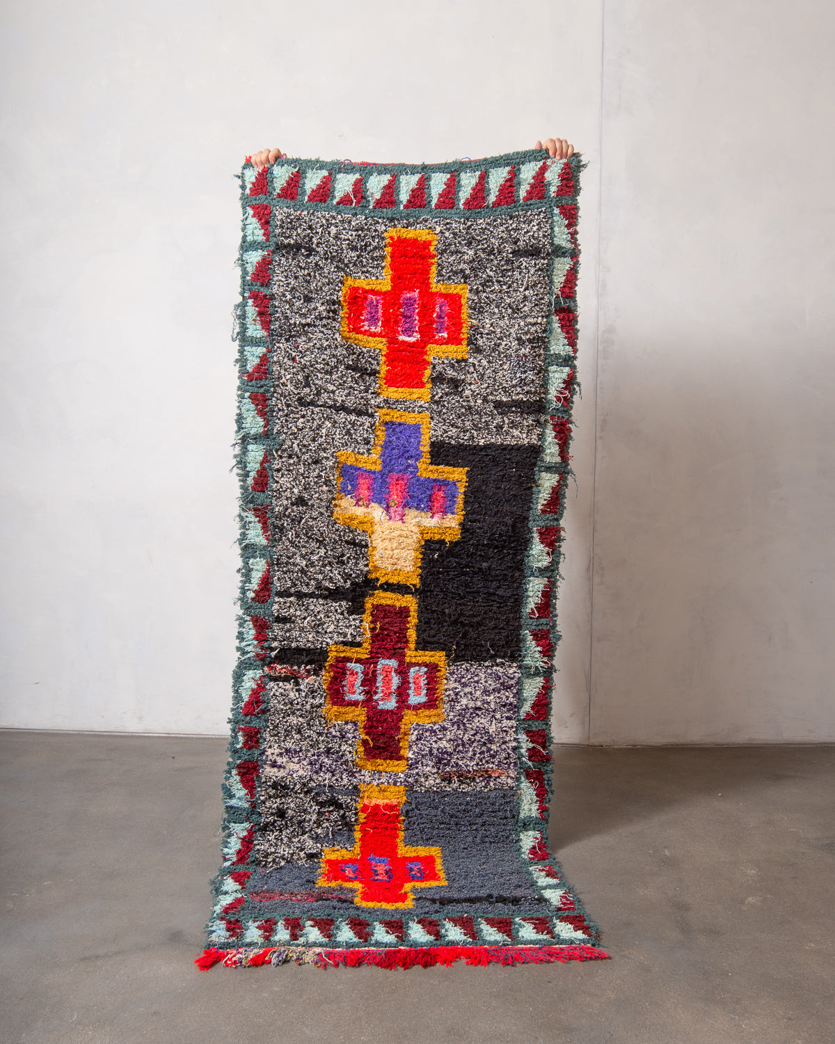 Modern designer vintage handcrafted Berber rug from Morocco. Boucherouite runner rug with beautiful colors and patterns.