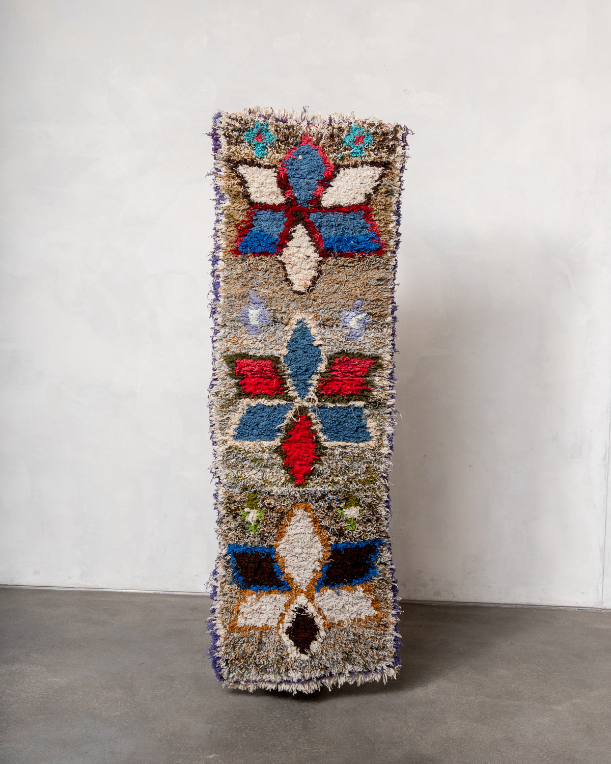 Modern designer vintage handcrafted Berber rug from Morocco. Boucherouite runner rug with beautiful colors and patterns.