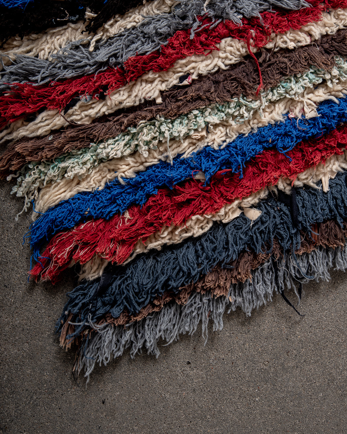 Modern designer vintage handcrafted Berber rug from Morocco. Boucherouite runner rug with beautiful colors and patterns.