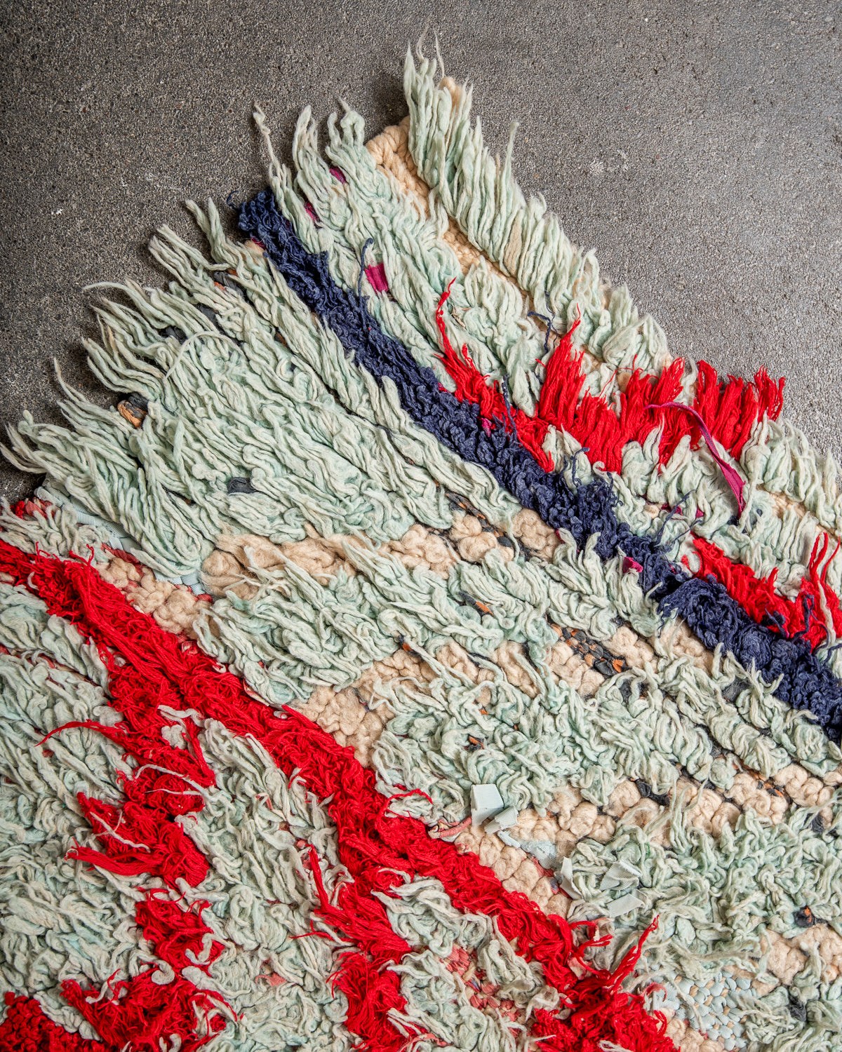 Modern designer vintage handcrafted Berber rug from Morocco. Boucherouite runner rug with beautiful colors and patterns.