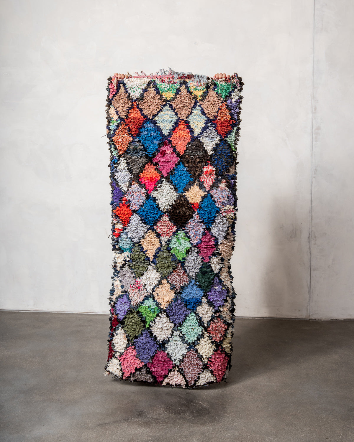 Modern designer vintage handcrafted Berber rug from Morocco. Boucherouite runner rug with beautiful colors and patterns.