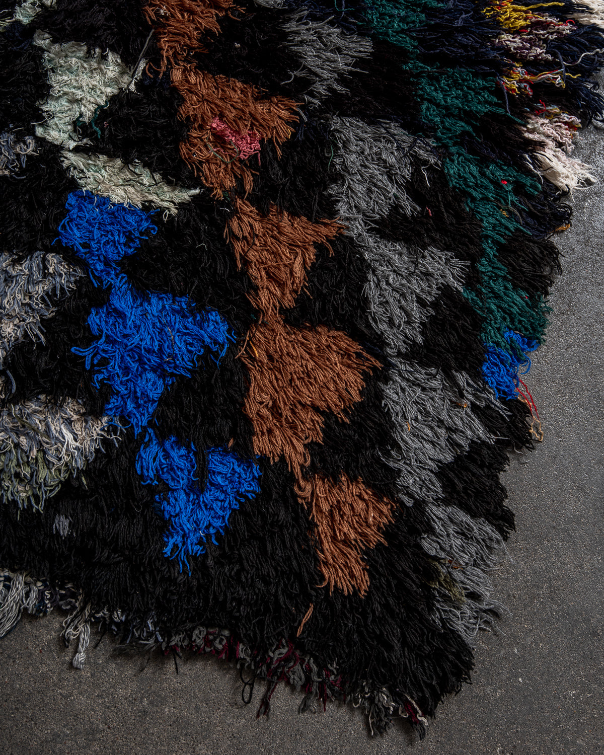 Modern designer vintage handcrafted Berber rug from Morocco. Boucherouite runner rug with beautiful colors and patterns.