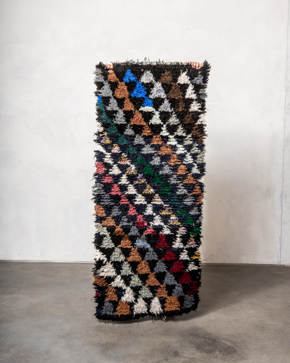 Modern designer vintage handcrafted Berber rug from Morocco. Boucherouite runner rug with beautiful colors and patterns.